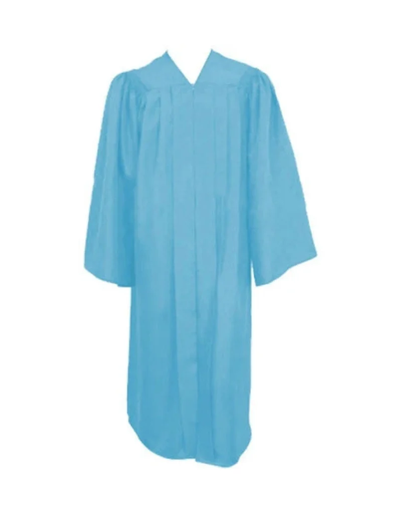 Adult woman wearing light blue graduation gown outfit with cap for university graduation
